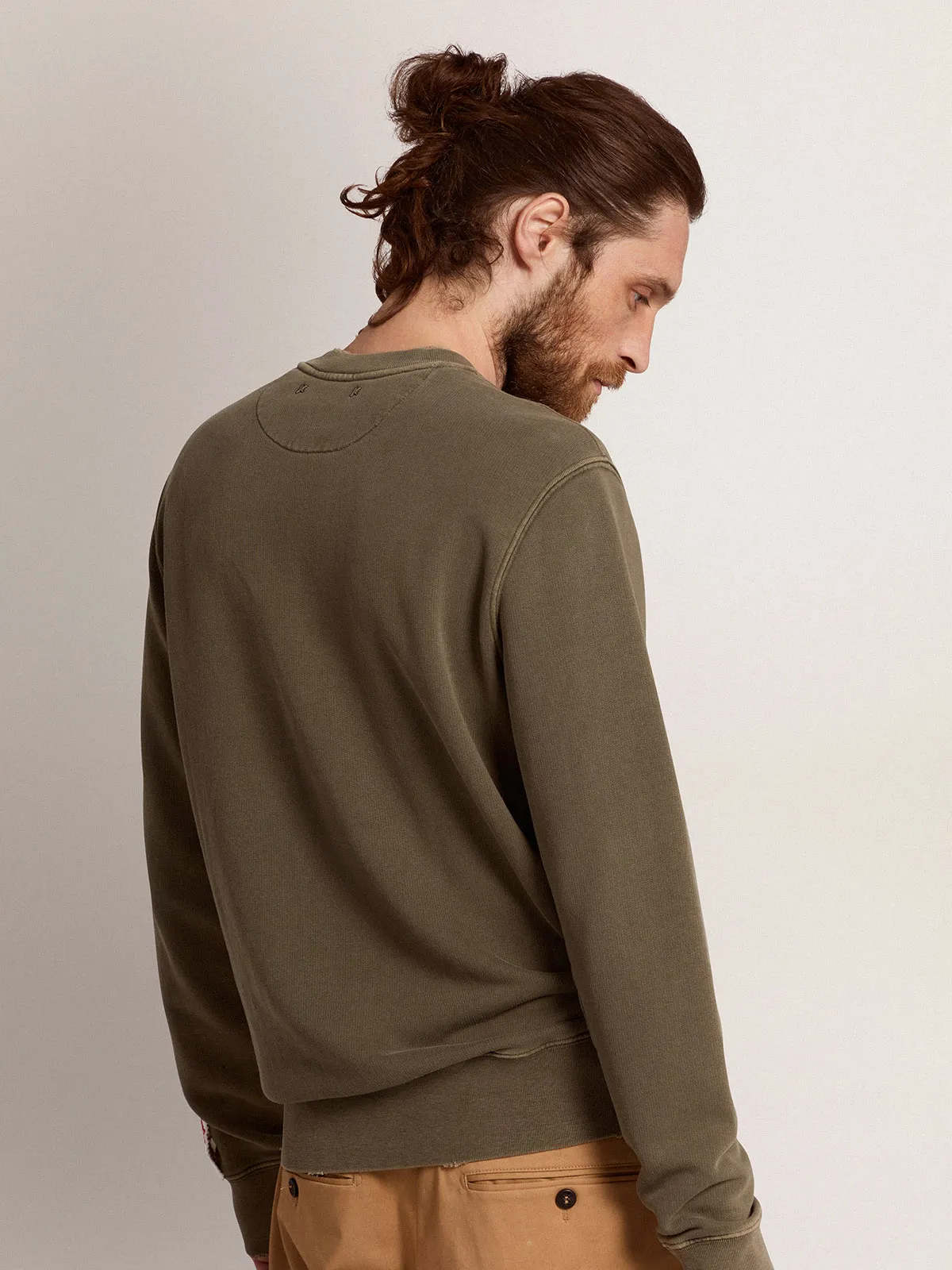 Men's olive green sweatshirt with Golden lettering